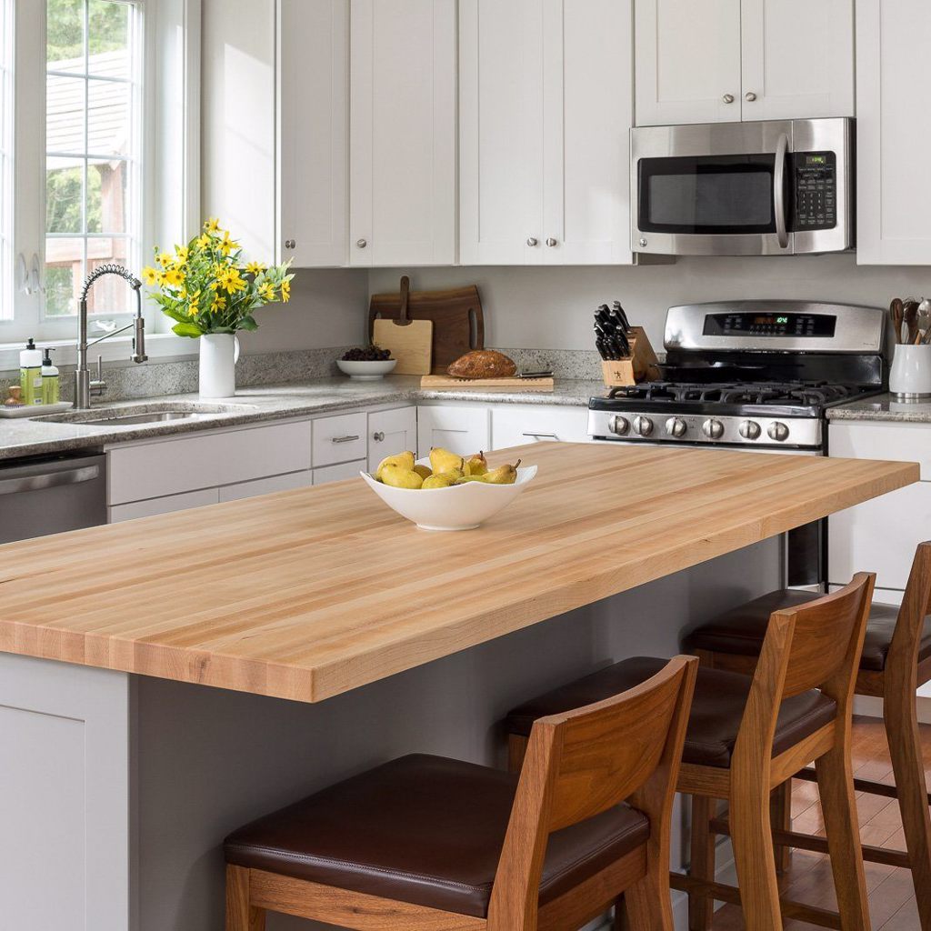One of our finished Maple butcher block countertops installed as a kitchen island.